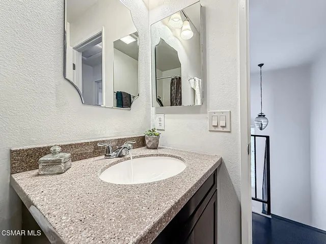 a bed room with bed and a window