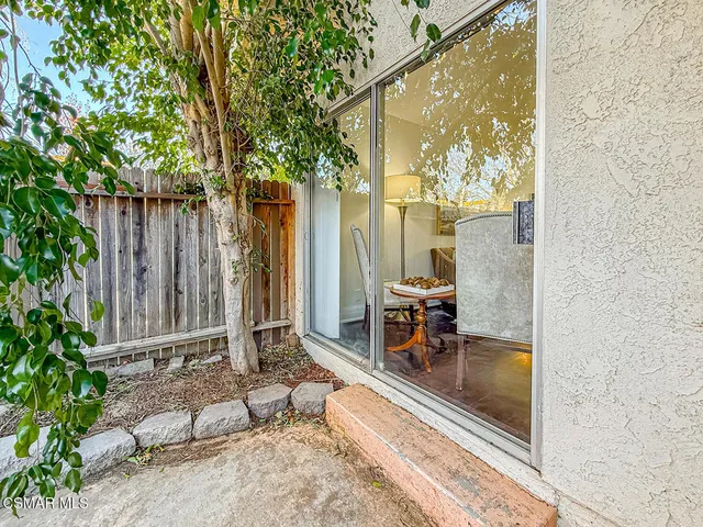 a view of a back yard of the house