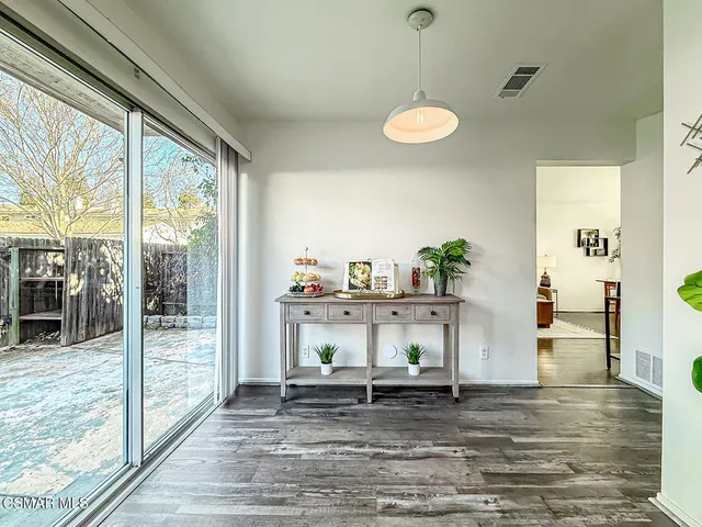a view of kitchen with furniture and window