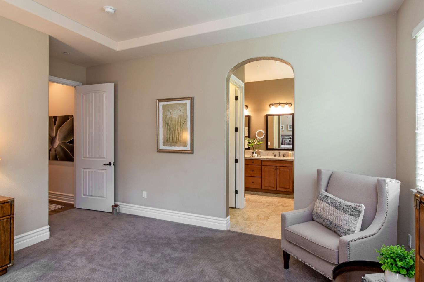 7217 Pitlochry Drive Gilroy, CA 95020 - Photo 16 of 66 a view of a livingroom with furniture and a mirror