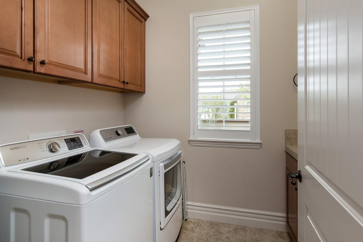 7217 Pitlochry Drive Gilroy, CA 95020 - Photo 29 of 66 a utility room with dryer and washer