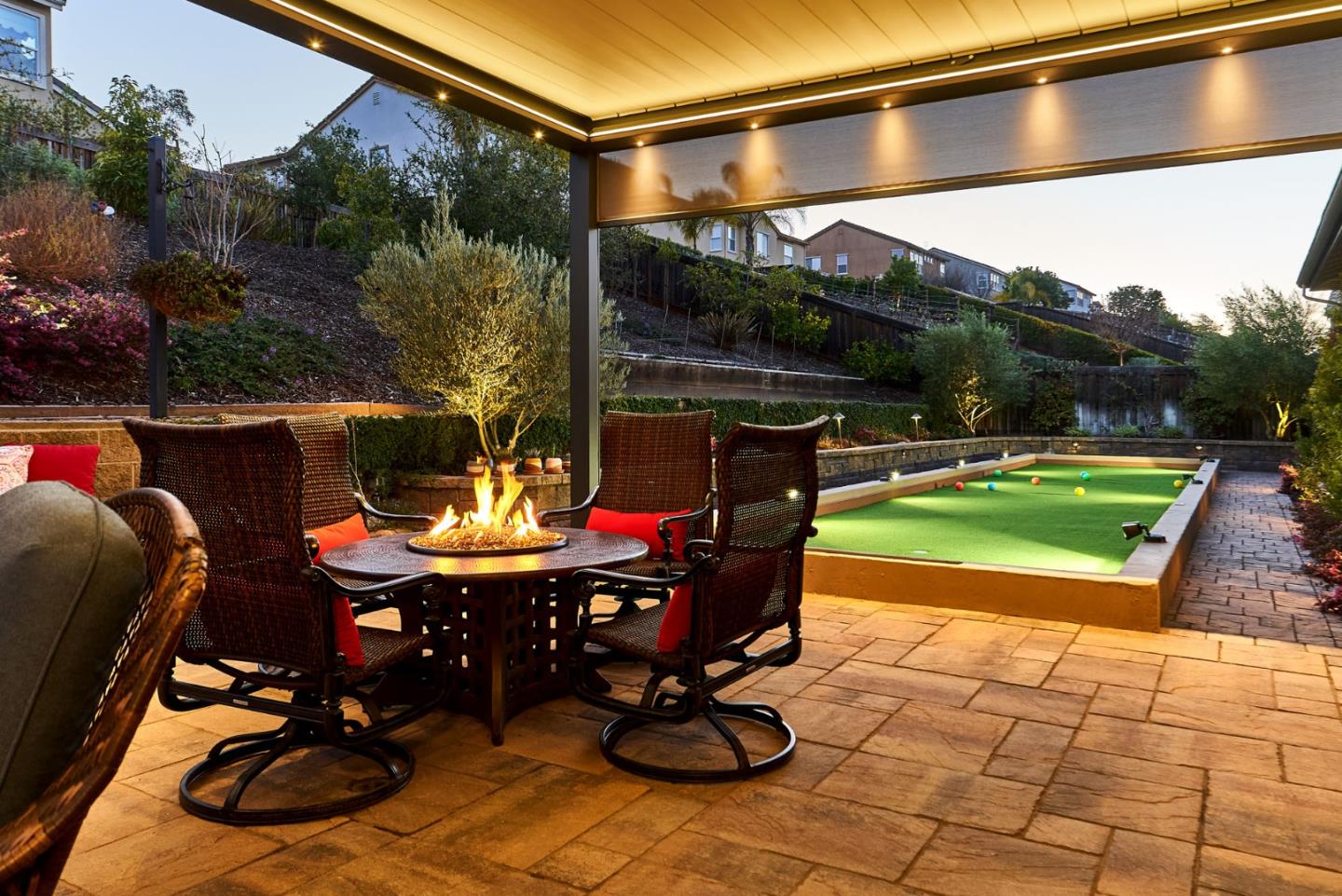 7217 Pitlochry Drive Gilroy, CA 95020 - Photo 34 of 66 a view of a patio with a dining table and chairs