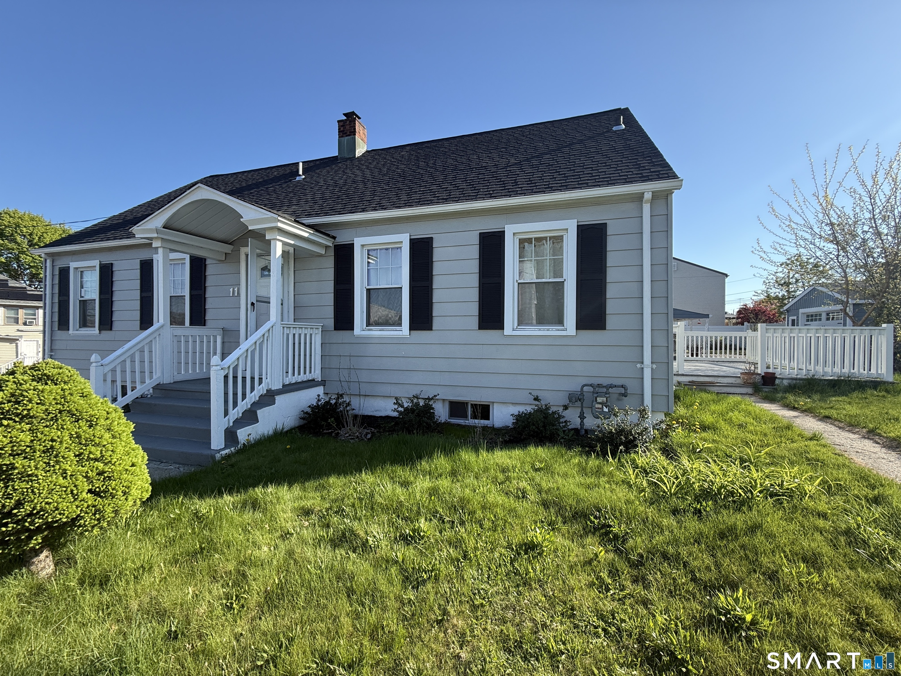 11 Colony Street Stratford, CT 06615 - Photo 2 of 16 a front view of a house with a yard