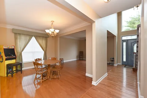 a bathroom with a sink mirror and vanity