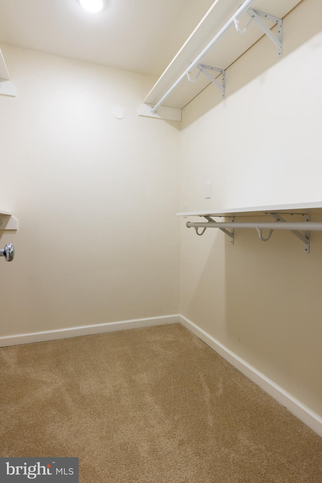 8296 Lindside Way Springfield, VA 22153 - Photo 26 of 44 Primary bedroom walk-in closet