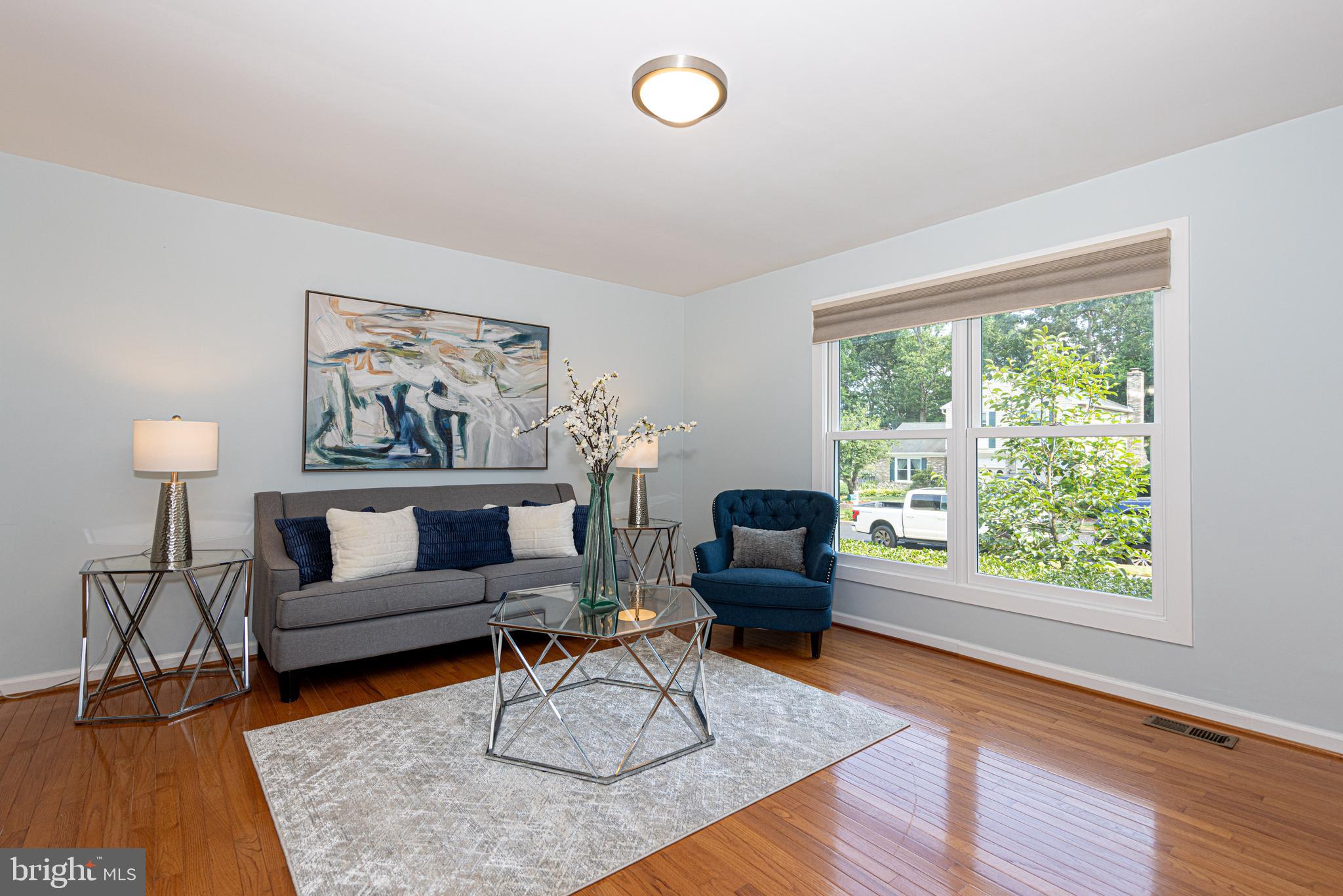 8296 Lindside Way Springfield, VA 22153 - Photo 8 of 44 Large bright living room-note the updated windows