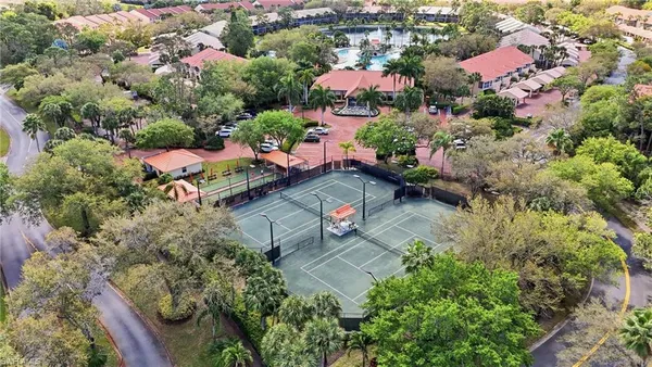 an aerial view of a house with outdoor space