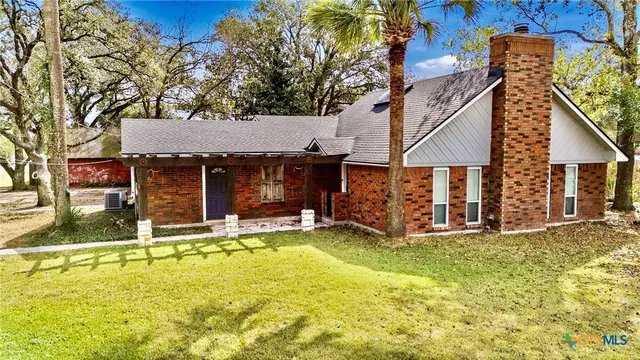 front view of a house with swimming pool