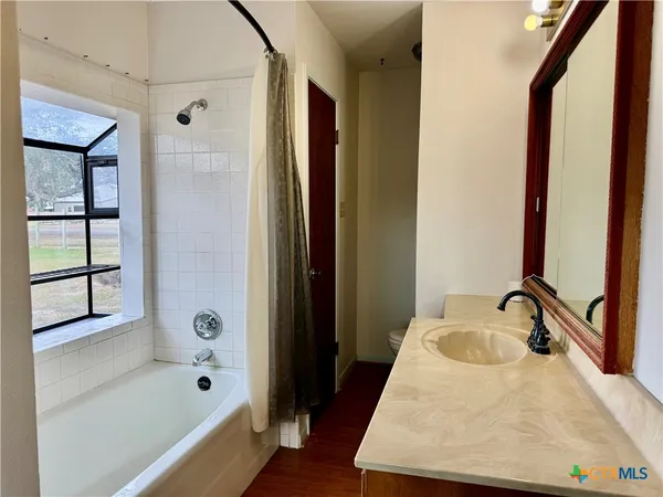 a small space with a hardwood floor