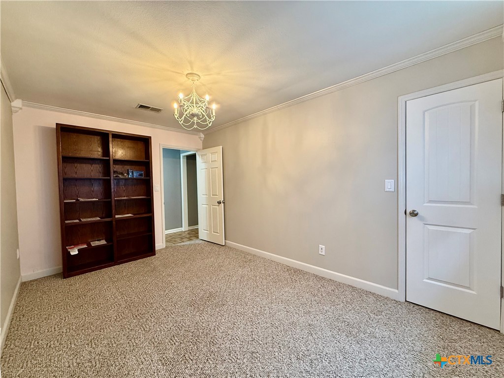20 Hambleton Road Victoria, TX 77905 - Photo 25 of 42 a view of an empty room with a cabinet and a window