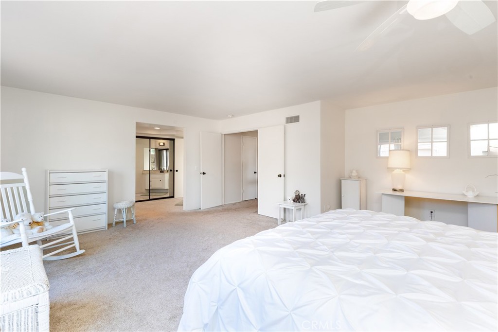 8224 Seranata Drive Whittier, CA 90605 - Photo 20 of 55 a spacious bedroom with a bed and a window