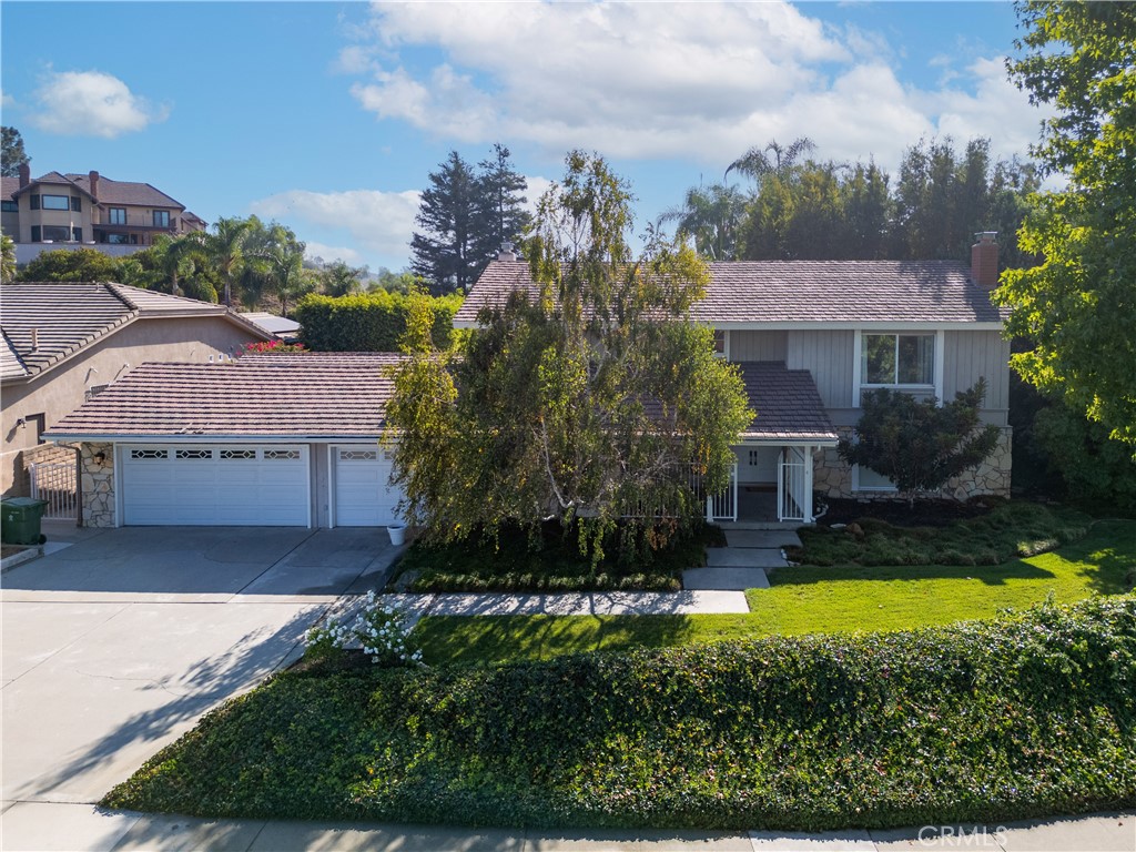 8224 Seranata Drive Whittier, CA 90605 - Photo 3 of 55 a view of a house with swimming pool yard and outdoor seating