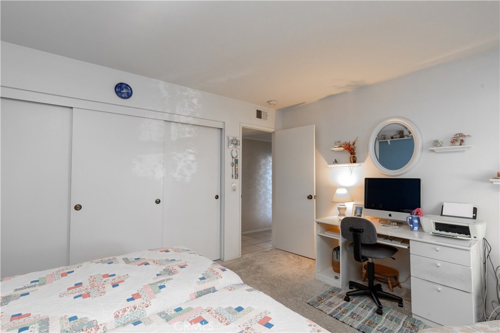 8224 Seranata Drive Whittier, CA 90605 - Photo 40 of 55 a bedroom with a bed and a flat screen tv