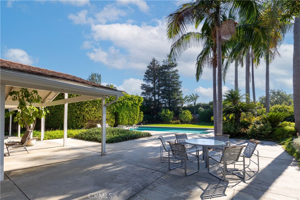 8224 Seranata Drive Whittier, CA 90605 - Photo 42 of 55 a view of a table and chairs in patio with a backyard