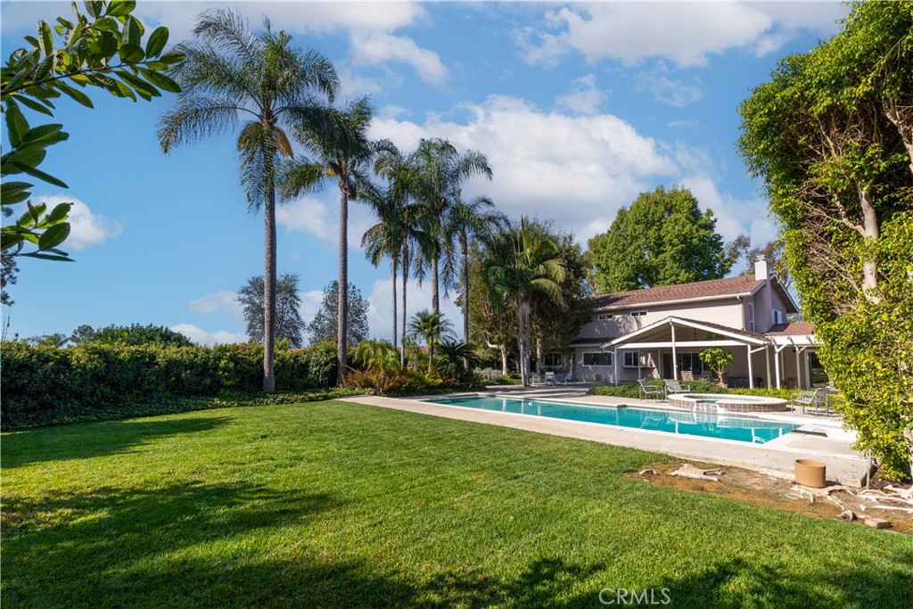 8224 Seranata Drive Whittier, CA 90605 - Photo 46 of 55 a front view of house with yard and outdoor seating