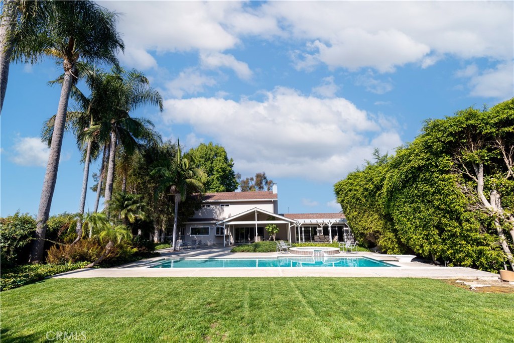 8224 Seranata Drive Whittier, CA 90605 - Photo 49 of 55 a front view of a house with a yard table and chairs