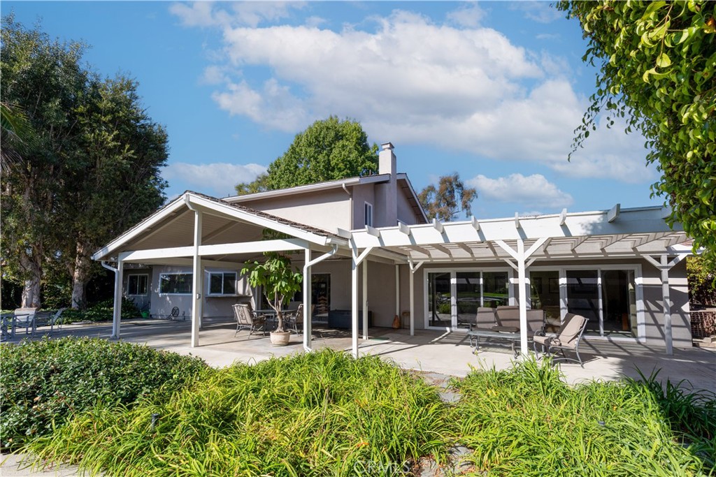 8224 Seranata Drive Whittier, CA 90605 - Photo 50 of 55 a view of a house with a chairs and a table and chairs