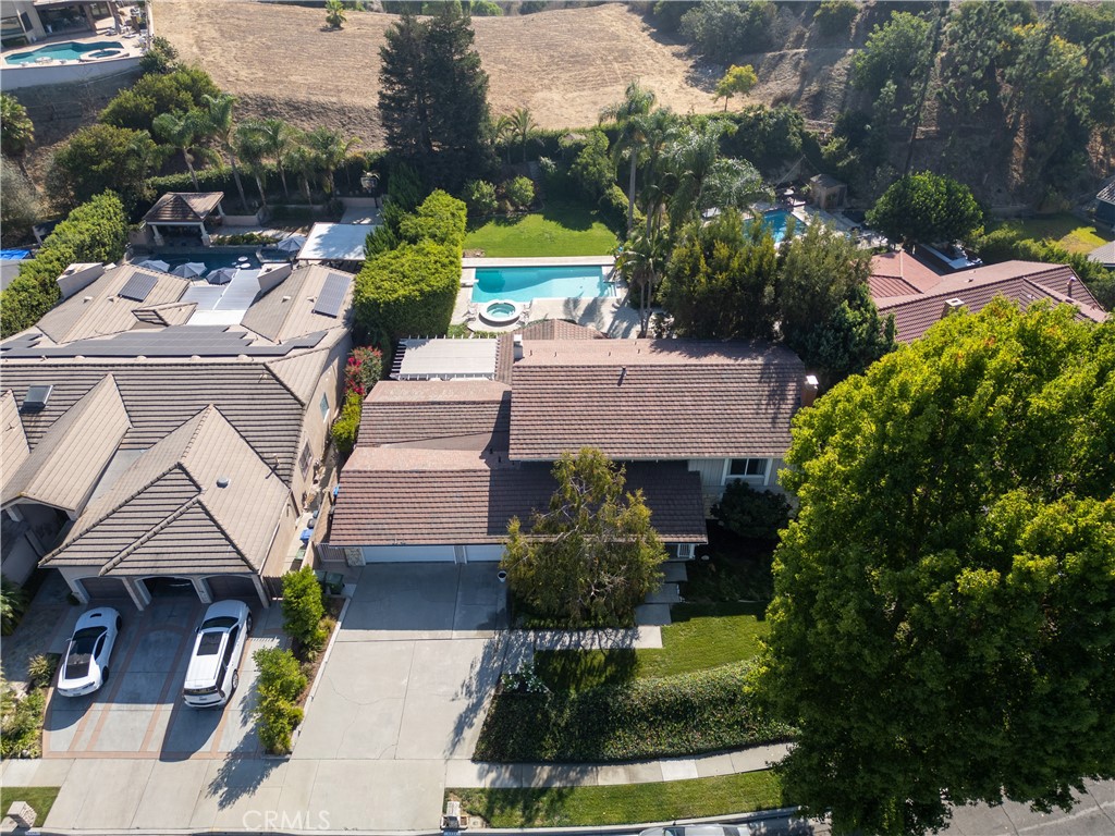 8224 Seranata Drive Whittier, CA 90605 - Photo 5 of 55 an aerial view of a house with garden space seating area and yard