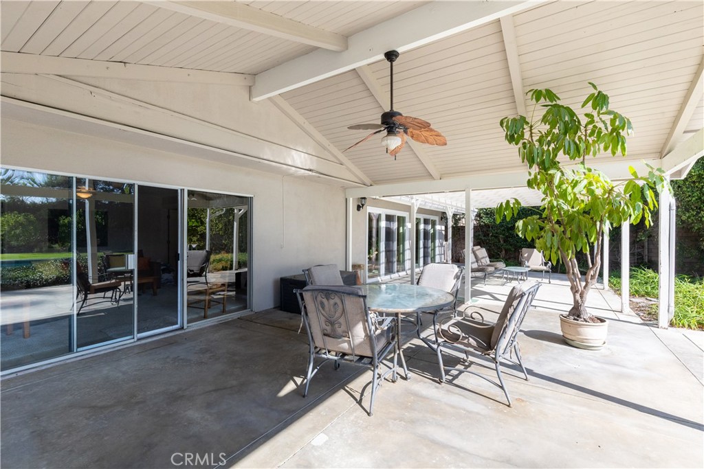 8224 Seranata Drive Whittier, CA 90605 - Photo 52 of 55 a view of a patio with a table and chairs and potted plants