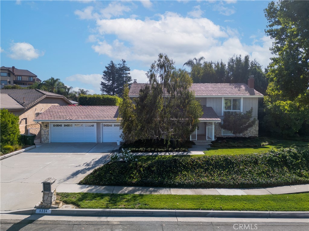 8224 Seranata Drive Whittier, CA 90605 - Photo 8 of 55 a front view of a house with a yard