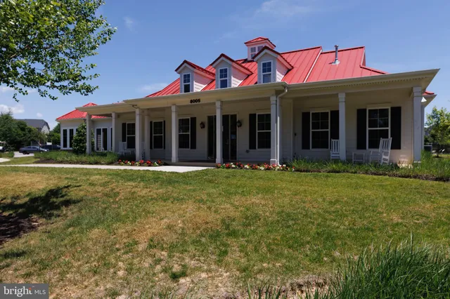 front view of a house with a garden
