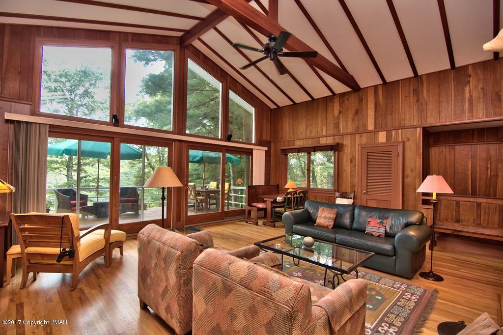 342 Summit Road Swiftwater, PA 18370 - Photo 14 of 53 a living room with furniture and a large window