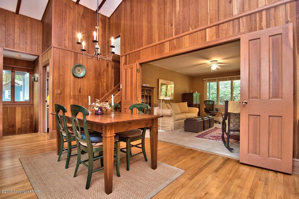 342 Summit Road Swiftwater, PA 18370 - Photo 20 of 53 a view of a dining room with furniture and wooden floor