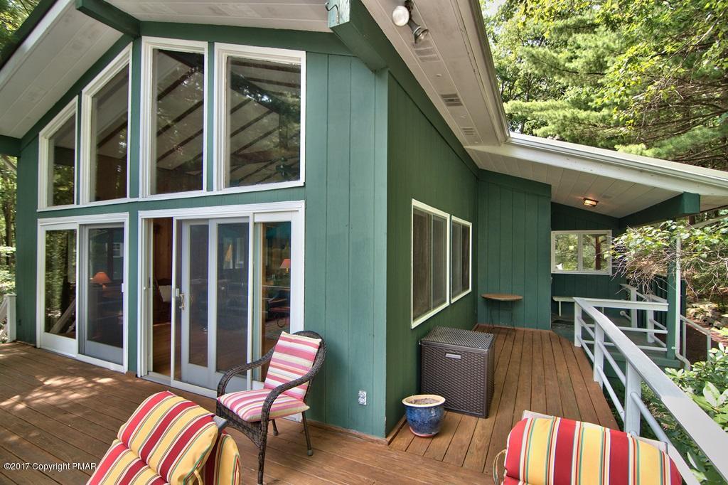 342 Summit Road Swiftwater, PA 18370 - Photo 2 of 53 a view of balcony with furniture and outdoor shower