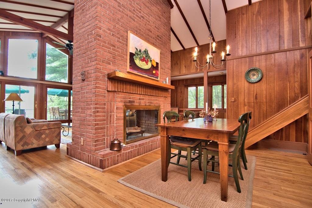 342 Summit Road Swiftwater, PA 18370 - Photo 21 of 53 a view of a livingroom with furniture and a fireplace