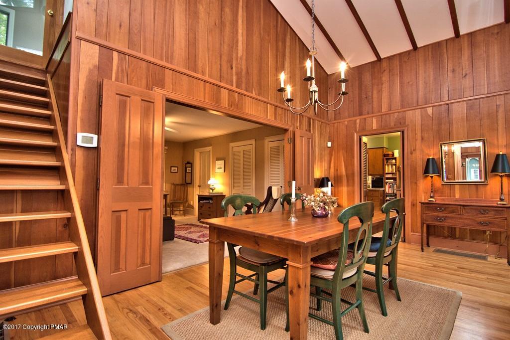 342 Summit Road Swiftwater, PA 18370 - Photo 23 of 53 a dining room with furniture and wooden floor