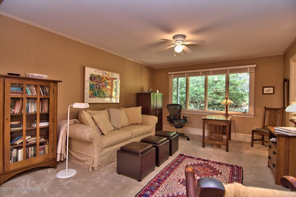 342 Summit Road Swiftwater, PA 18370 - Photo 36 of 53 a living room with furniture and a window