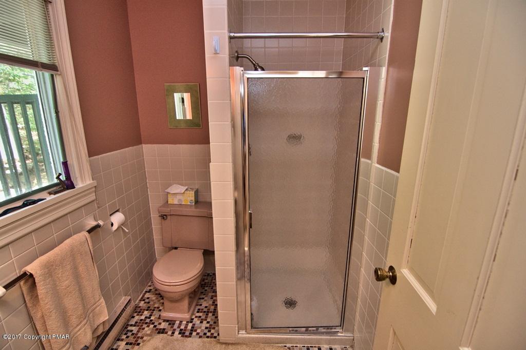 342 Summit Road Swiftwater, PA 18370 - Photo 39 of 53 a bathroom with a toilet and a shower