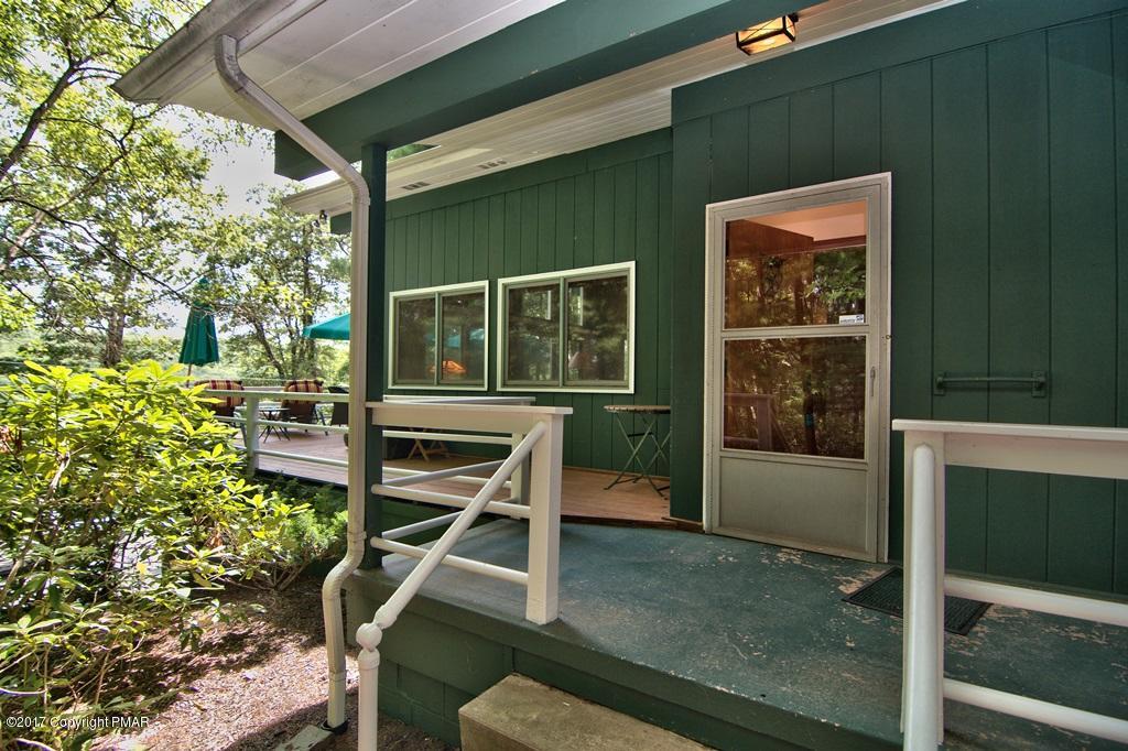 342 Summit Road Swiftwater, PA 18370 - Photo 5 of 53 a backyard of a house with table and chairs