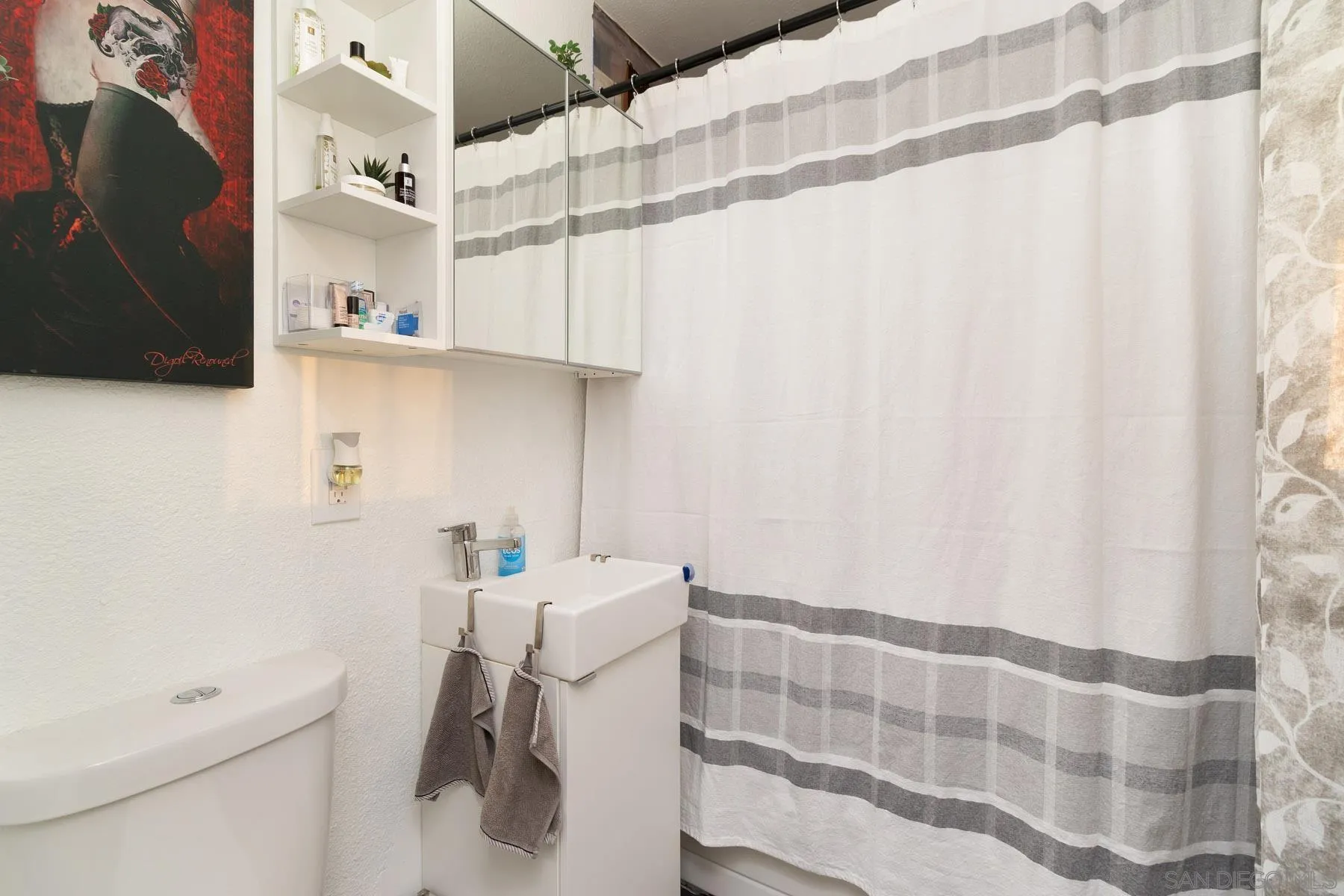 501 Thayer Drive Spring Valley, CA 91977 - Photo 11 of 20 a bathroom with a sink toilet and shower