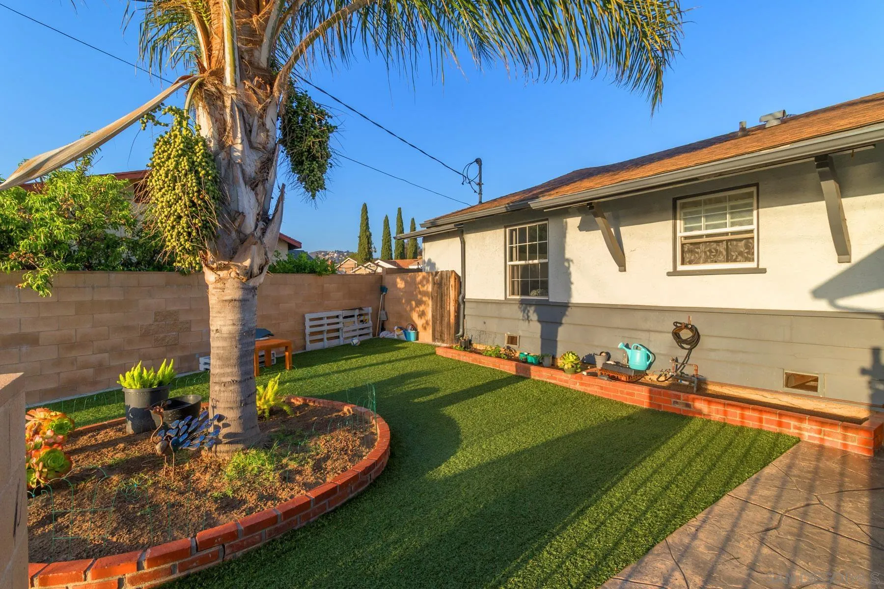501 Thayer Drive Spring Valley, CA 91977 - Photo 16 of 20 a front view of a house with garden