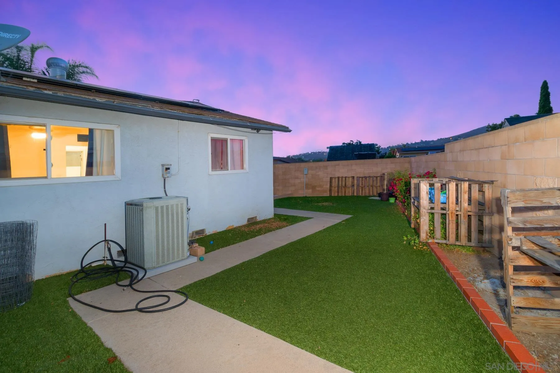 501 Thayer Drive Spring Valley, CA 91977 - Photo 20 of 20 a backyard of a house with table and chairs