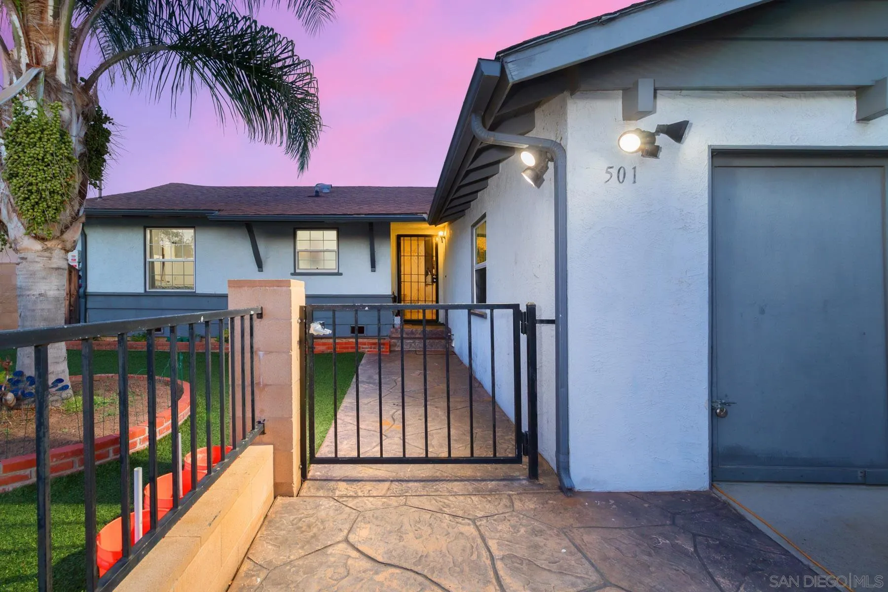 501 Thayer Drive Spring Valley, CA 91977 - Photo 2 of 20 a view of a house with iron fence