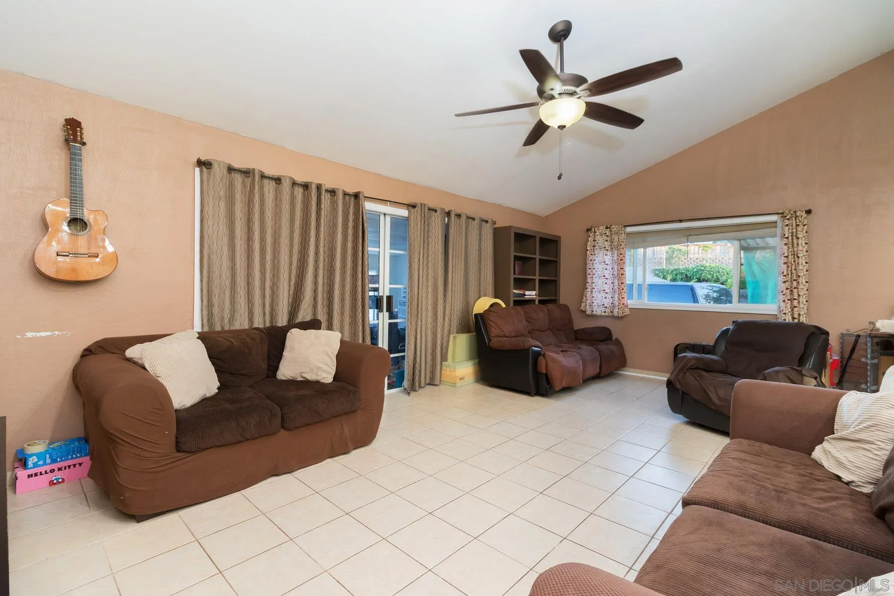 501 Thayer Drive Spring Valley, CA 91977 - Photo 7 of 20 a living room with furniture and a large window