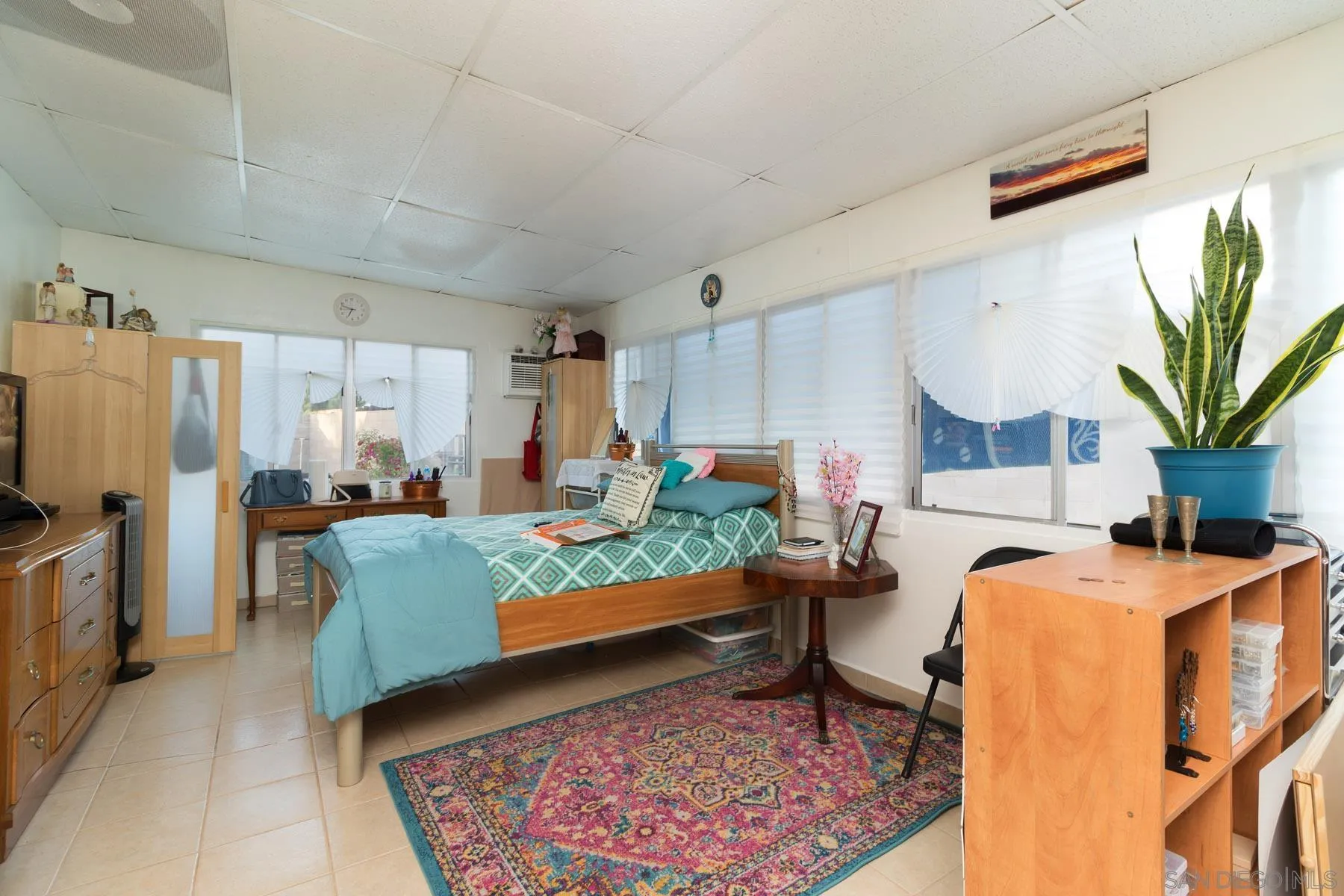 501 Thayer Drive Spring Valley, CA 91977 - Photo 8 of 20 a living room with furniture fireplace and a table