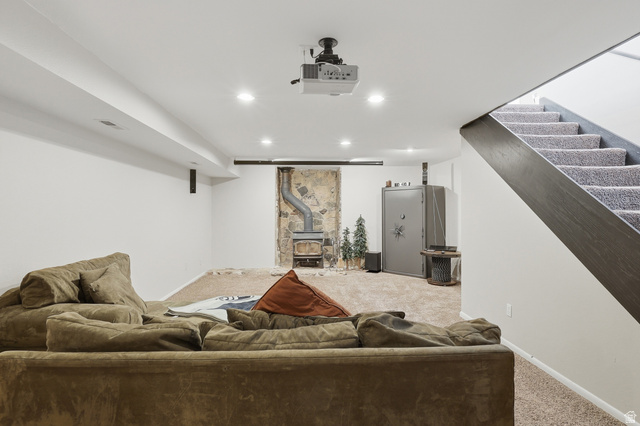 114 North Clark Lane Elk Ridge, UT 84651 - Photo 16 of 26 Finished basement space featuring recessed lighting and carpeted flooring