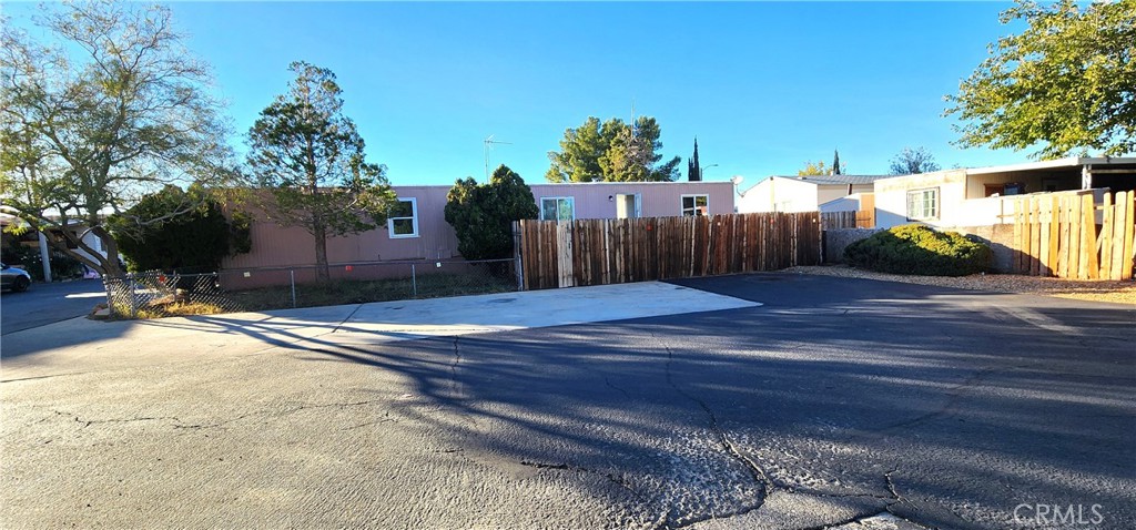 8562 C Avenue, Unit 48 Hesperia, CA 92345 - Photo 2 of 37 a view of a backyard of the house