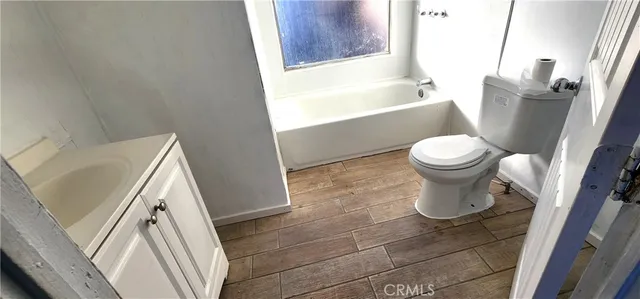 a bathroom with a sink and a bathtub