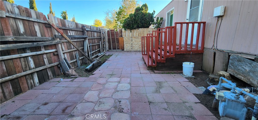 8562 C Avenue, Unit 48 Hesperia, CA 92345 - Photo 29 of 37 a view of a backyard with sitting area