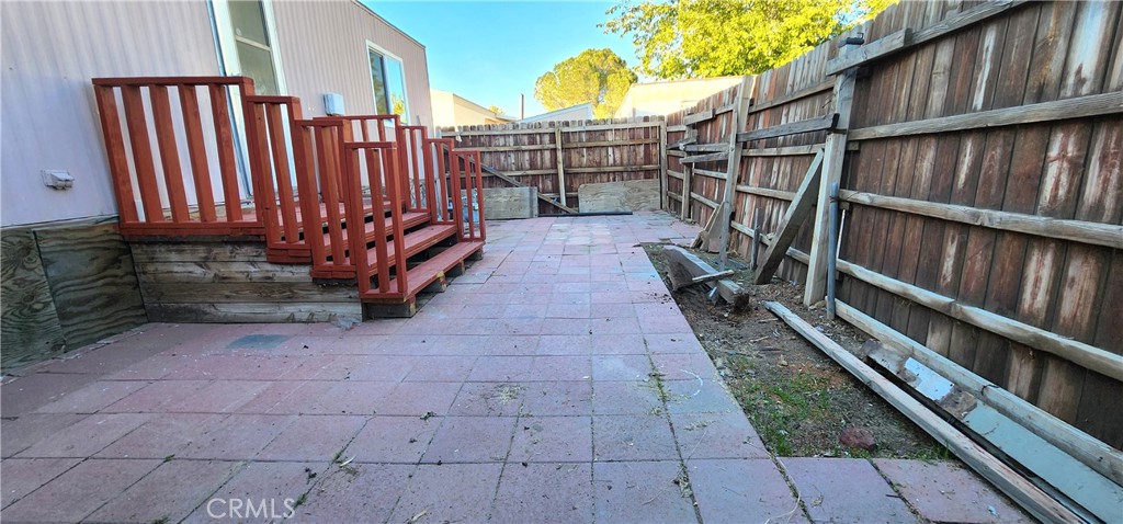 8562 C Avenue, Unit 48 Hesperia, CA 92345 - Photo 30 of 37 a view of entryway with wooden floor and fence