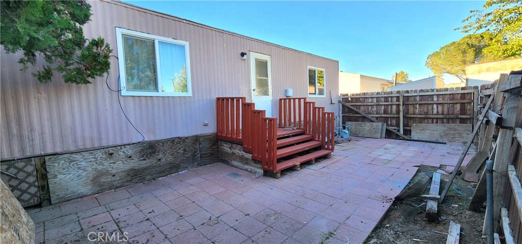 8562 C Avenue, Unit 48 Hesperia, CA 92345 - Photo 32 of 37 a view of a porch with a bench
