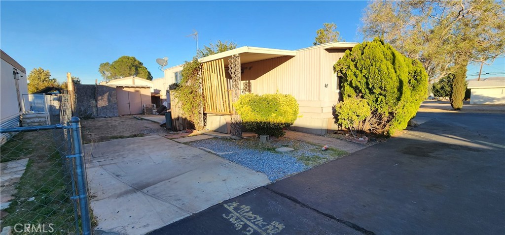 8562 C Avenue, Unit 48 Hesperia, CA 92345 - Photo 36 of 37 a view of a park with iron fence