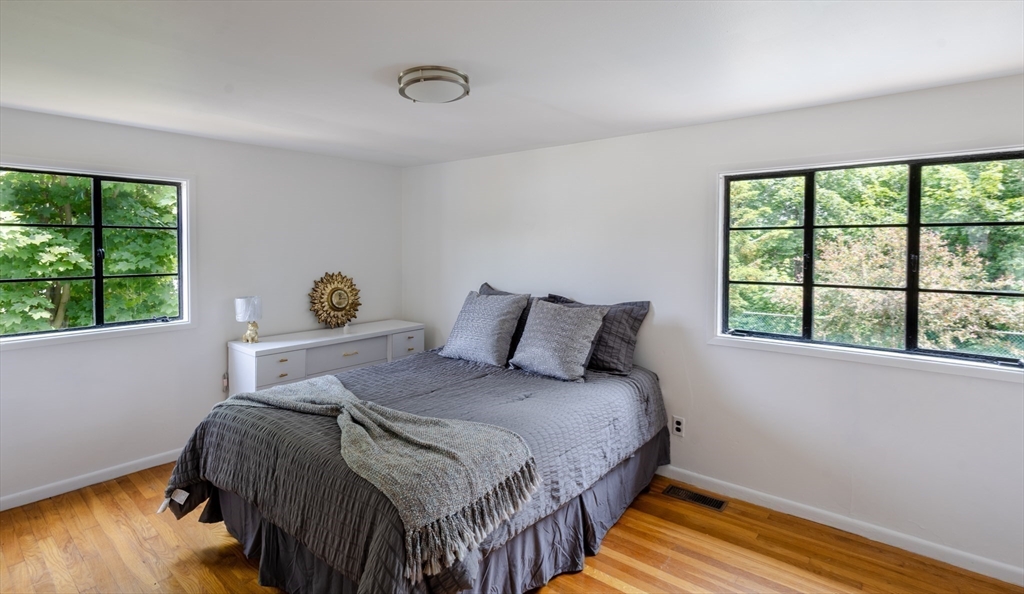 30 Leighton Road Boston, MA 02136 - Photo 12 of 38 a bedroom with a bed and a window