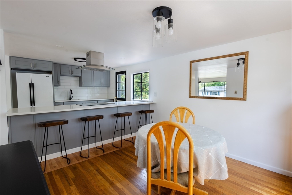30 Leighton Road Boston, MA 02136 - Photo 16 of 38 a view of a kitchen counter space and wooden floor
