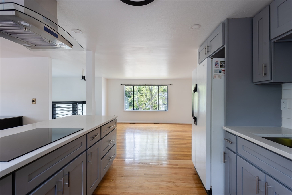 30 Leighton Road Boston, MA 02136 - Photo 19 of 38 a kitchen with stainless steel appliances a refrigerator and a sink