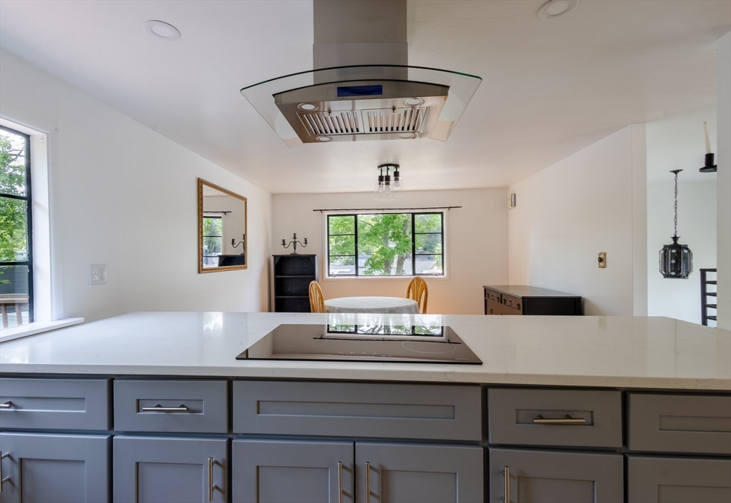 30 Leighton Road Boston, MA 02136 - Photo 20 of 38 a view of a kitchen with a table and window